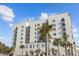 White building exterior with palm trees and balconies at 1 King St # 503, Charleston, SC 29401