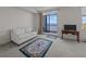 Living room with sofa, rug, and balcony access at 1 King St # 503, Charleston, SC 29401