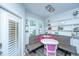 Bright kitchen nook with built-in bench seating and white shelves at 1014 Rosewood Ln, Mount Pleasant, SC 29464