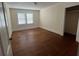 Simple bedroom with hardwood floors and closet at 109 Quaker Rd, Saint George, SC 29477