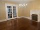 Elegant dining room with hardwood floors and a chandelier at 109 Quaker Rd, Saint George, SC 29477