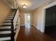 Bright entryway with hardwood floors and staircase at 109 Quaker Rd, Saint George, SC 29477