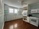 Kitchen with white cabinets, granite counters, and hardwood floors at 109 Quaker Rd, Saint George, SC 29477