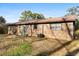 Brick ranch house with a large backyard and storage shed at 116 Eagle Dr, Summerville, SC 29485