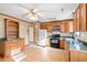 Eat-in kitchen with oak cabinets and tiled floor at 116 Eagle Dr, Summerville, SC 29485