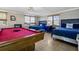 Basement with pool table and two twin beds at 1308 Palmetto Blvd Blvd, Edisto Beach, SC 29438