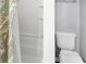 Small bathroom with shower/tub combo and toilet at 1308 Palmetto Blvd Blvd, Edisto Beach, SC 29438