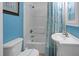Bathroom with white vanity, tub, and shower at 1308 Palmetto Blvd Blvd, Edisto Beach, SC 29438