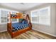 Bedroom with bunk beds and window seating at 1308 Palmetto Blvd Blvd, Edisto Beach, SC 29438
