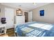 Bedroom with a white dresser, and double bed with blue bedding at 1308 Palmetto Blvd Blvd, Edisto Beach, SC 29438