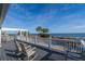 Relaxing deck with rocking chairs and ocean view at 1308 Palmetto Blvd Blvd, Edisto Beach, SC 29438