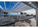 Deck with pergola, table, and ocean view at 1308 Palmetto Blvd Blvd, Edisto Beach, SC 29438