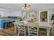 Bright dining area with white table and chairs at 1308 Palmetto Blvd Blvd, Edisto Beach, SC 29438