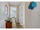 Bright hallway with wood-look floors and access to bedrooms at 1308 Palmetto Blvd Blvd, Edisto Beach, SC 29438