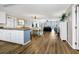 Open concept kitchen with island and hardwood floors at 1308 Palmetto Blvd Blvd, Edisto Beach, SC 29438