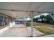Covered patio overlooking the backyard and pool at 1308 Palmetto Blvd Blvd, Edisto Beach, SC 29438