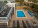 Elevated pool with lounge chairs and spacious deck at 1308 Palmetto Blvd Blvd, Edisto Beach, SC 29438
