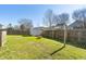 Fully fenced backyard with shed and open green space for outdoor activities at 139 Blue Jasmine Ln, Summerville, SC 29483