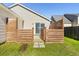 Well-maintained backyard with enclosed patio and stepping stone path at 139 Blue Jasmine Ln, Summerville, SC 29483