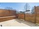 Concrete patio with wooden privacy fence and built-in seating provides a great outdoor space at 139 Blue Jasmine Ln, Summerville, SC 29483