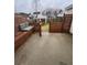 Private backyard with a patio and wooden seating at 139 Blue Jasmine Ln, Summerville, SC 29483