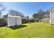 Spacious backyard features a shed and ample green space at 139 Blue Jasmine Ln, Summerville, SC 29483