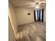 Bright bedroom featuring grey wood-look flooring at 139 Blue Jasmine Ln, Summerville, SC 29483