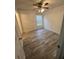 Bedroom with wood-look flooring and ceiling fan at 139 Blue Jasmine Ln, Summerville, SC 29483