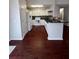 Kitchen with white cabinets, granite countertops, and hardwood floors at 139 Blue Jasmine Ln, Summerville, SC 29483