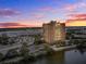 Aerial view of building at sunset, near water at 14 Lockwood Dr # 6H, Charleston, SC 29401