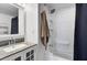 Clean bathroom with a shower/tub combo and granite vanity at 14 Lockwood Dr # 6H, Charleston, SC 29401