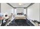 Bright bedroom with queen bed and home office setup at 14 Lockwood Dr # 6H, Charleston, SC 29401