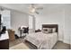 Comfortable bedroom with a queen-size bed and home office at 14 Lockwood Dr # 6H, Charleston, SC 29401