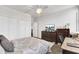 Bedroom with a queen bed, dresser, and workspace at 14 Lockwood Dr # 6H, Charleston, SC 29401