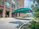 Ashley House entrance with covered drop off at 14 Lockwood Dr # 6H, Charleston, SC 29401