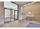 Brick building with covered entrance and seating area at 14 Lockwood Dr # 6H, Charleston, SC 29401