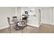 Bright dining area with a round table and four chairs at 14 Lockwood Dr # 6H, Charleston, SC 29401