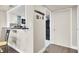 View of entryway and kitchen from living area at 14 Lockwood Dr # 6H, Charleston, SC 29401