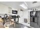 Modern kitchen with black appliances and granite counters at 14 Lockwood Dr # 6H, Charleston, SC 29401