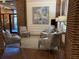 Lobby sitting area with comfortable chairs and patterned rug at 14 Lockwood Dr # 6H, Charleston, SC 29401
