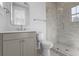 Modern bathroom with a glass shower and gray vanity at 1461 Lieben Rd, Mount Pleasant, SC 29466