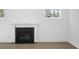Modern fireplace with white mantel in a spacious living room at 1461 Lieben Rd, Mount Pleasant, SC 29466
