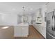 Open kitchen with large island and stainless steel appliances at 1461 Lieben Rd, Mount Pleasant, SC 29466