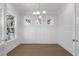 Bright office with hardwood floors, white walls, and a chandelier at 1461 Lieben Rd, Mount Pleasant, SC 29466
