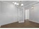 Home office with hardwood floors, white walls, and glass French doors at 1461 Lieben Rd, Mount Pleasant, SC 29466