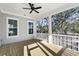 Screened porch with wood flooring and view of trees at 1461 Lieben Rd, Mount Pleasant, SC 29466