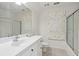 Simple bathroom with white vanity, toilet, and shower/tub combo at 15 31St Ave, Isle of Palms, SC 29451