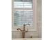 Bathroom detail showing a stylish freestanding bathtub faucet at 15 31St Ave, Isle of Palms, SC 29451