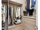 Well-organized closet with custom shelving and hanging rods at 15 31St Ave, Isle of Palms, SC 29451