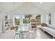 Spacious playroom with built-in window seat, lots of natural light and storage at 15 31St Ave, Isle of Palms, SC 29451